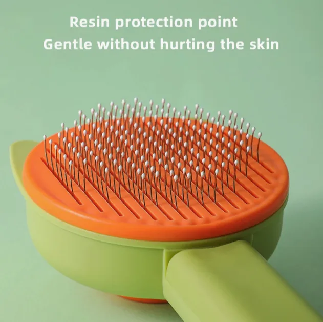 Self cleaning slicker brush
